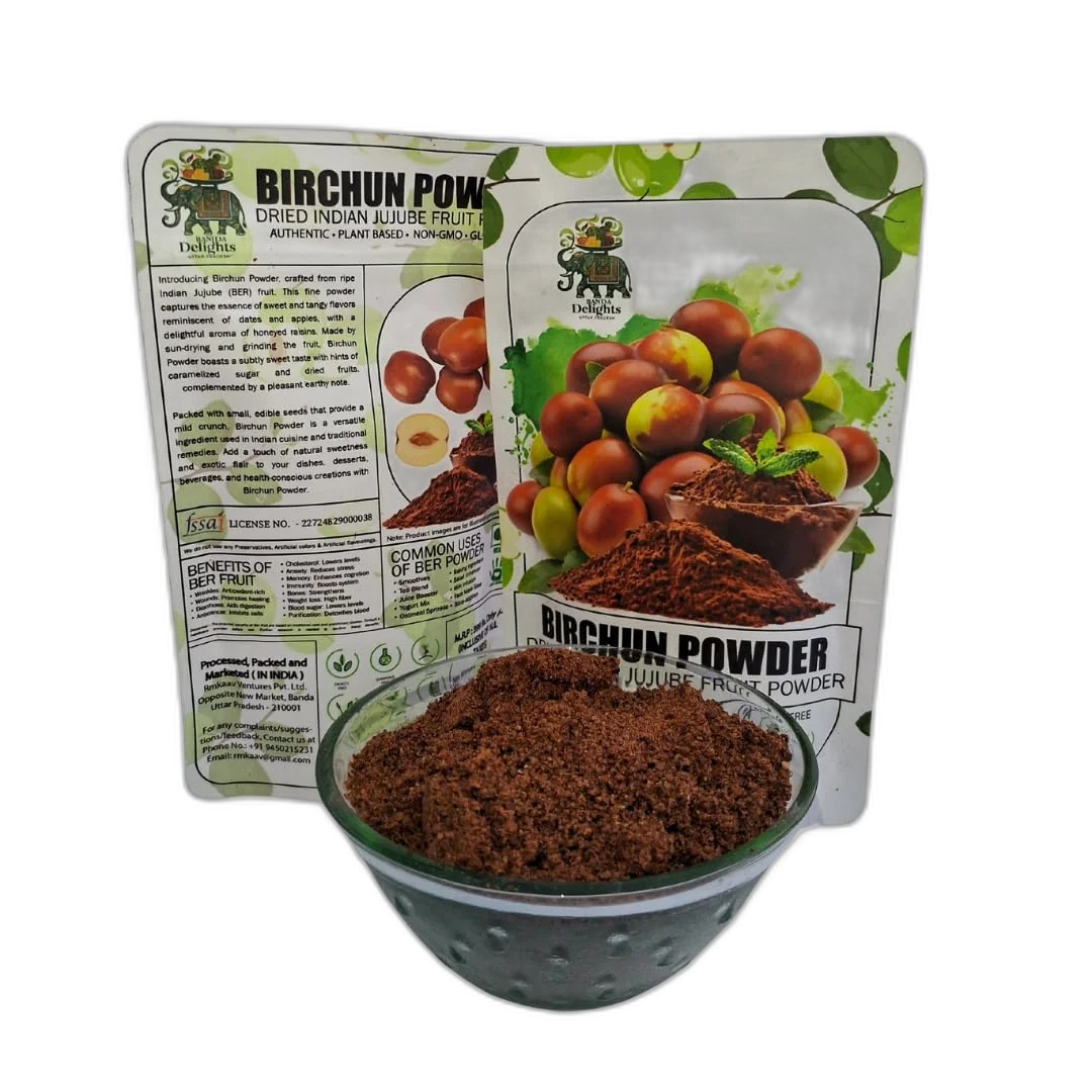 Birchun Powder in a brass bowl with raw jujube fruits beside it